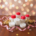 Handmade rose moulded candles in glass jars by Glowing Hands Studio