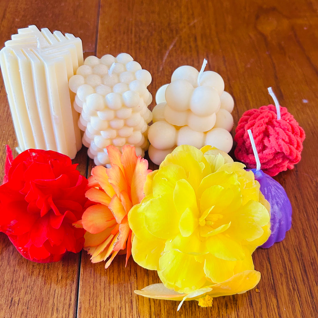 Handcrafted ivory rose pillar candle by Glowing Hands Studio